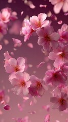 Naklejka premium Blooming cherry blossoms with petals gently falling against a soft pink background