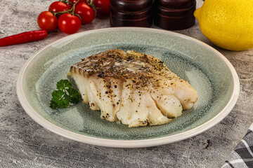 Baked cod fish fillet with spices