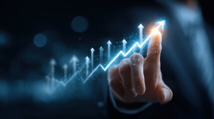 Businessman touching a glowing upward trend graph, symbolizing growth and success.