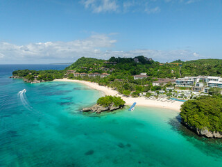 Fototapeta premium Beach resorts with beautiful white sands and clear turquoise sea water. Punta Bunga in Boracay, Philippines.