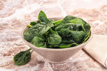 Fresh green spinach leaves heap