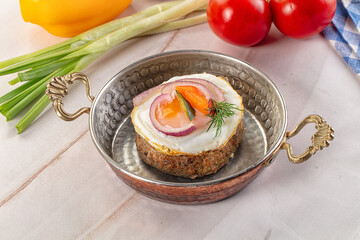 Beefsteak chop with roasted egg
