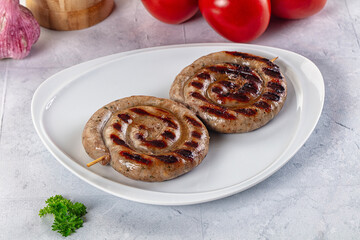 Grilled beef round circle sausages