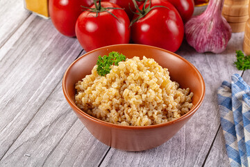 Vegan cuisine - boiled bulgur garnish