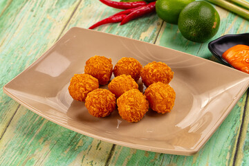 Fried crispy yellow cheese balls