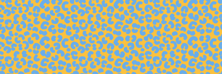 Seamless vector pattern with abstract blue leopard spots on a vivid yellow background. Bold and playful animal print design for fashion, kids wear, textiles