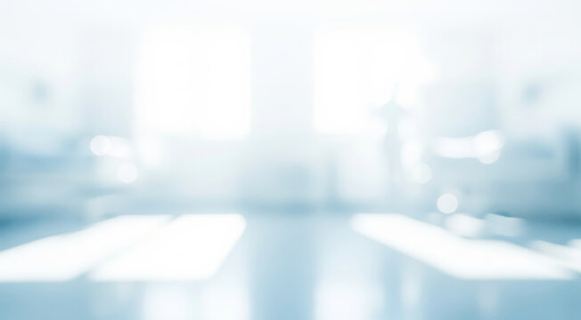 Abstract blurred background with light blue and white tones suggesting a clean space.