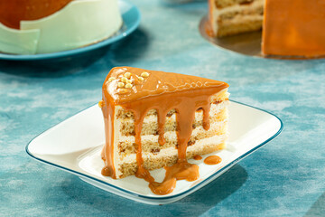Cake slice with caramel drizzle, simple and sweet.