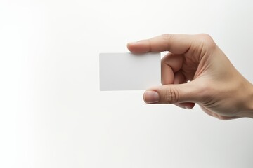 Businessman's hand holding blank paper business card, closeup isolated on white background