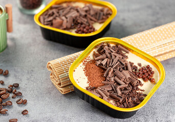 Milk chocolate mousse with hazelnut cream, rich and smooth.
