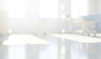 Blurred interior scene with bright light showing furniture and objects.