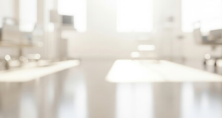 Blurred laboratory interior with equipment and bright light coming through windows.
