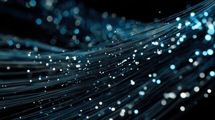 Fiber Optic Cables Emitting Blue Light in a Dark Environment