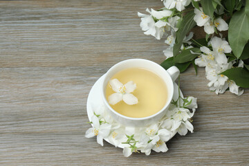 Organic Green Tea with Jasmine Flower and Jasmine Tea with Dried Leaves on tea cup