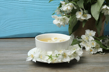 Organic Green Tea with Jasmine Flower and Jasmine Tea with Dried Leaves on tea cup