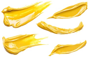 Isolated yellow paint strokes on a white background showing texture and brushwork in abstract form
