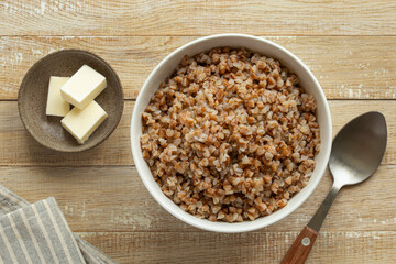 cooked buckwheat in white bowl,