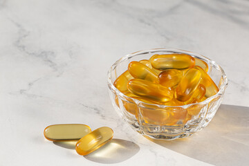 Fish oil Omega 3, Vitamin D or unsaturated fatty acids supplement capsules
