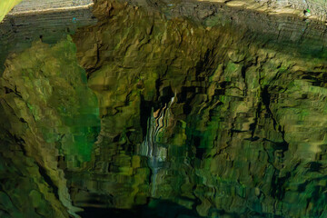 transparent pond in the cave