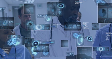 Analyzing diverse medical team reviewing holographic data in corridor, with stethoscope and tablet