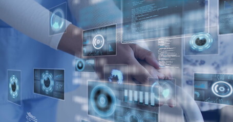 Grasping patient and scrub-clad caregiver holding walker handles in hospital ward with UI panels