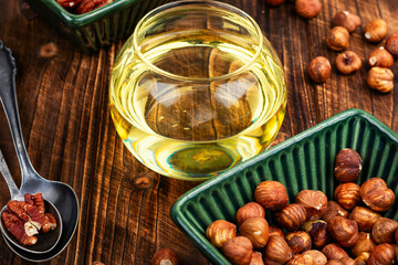 nut oil, glass with nut oil.