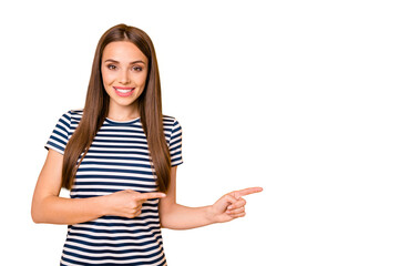 Photo of pretty lady indicating fingers empty space wear striped t-shirt isolated yellow background