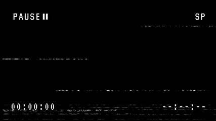 Pause VHS video tape on black background. 4K Stock Footage - Powered by Adobe