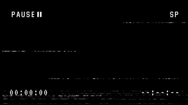 Pause VHS video tape on black background. 4K Stock Footage