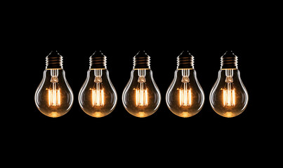 Electric incandescent lamp shines in the dark. Source of light. Symbol of idea. Many light bulbs on a black background