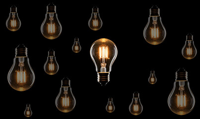 Electric incandescent lamp shines in the dark. Idea. Many light bulbs