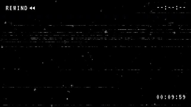 Rewind VHS video tape on black background. 4K Stock Footage