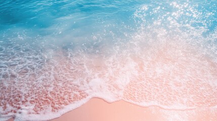 The blue and pink beach, with two or three small flowers dotting the picture. The background is the sparkling water, with thin strips of white foam, creating a bird's-eye view. The picture has soft to