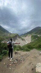 hiking in the mountains admiring the view 