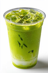Iced green tea latte with milk in clear plastic cup, refreshing and cold drink