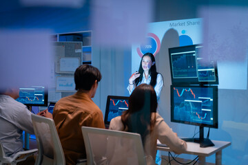 Businesswoman explaining colleagues during meeting and discussion business plan with coworker shareholder,discussing roadmap to product launch in office.planning,strategy,business development concept
