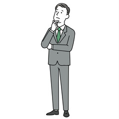 A graysuited man stands pondering with a hand to his chin