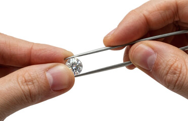 Jeweler's Hands Carefully Working with a Diamond and Metal Tweezers