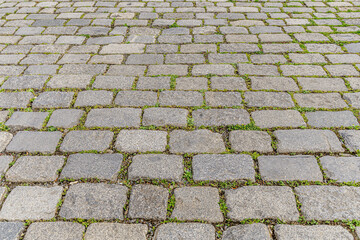 abstract background of stone tiled road perspective view shallow depth of field