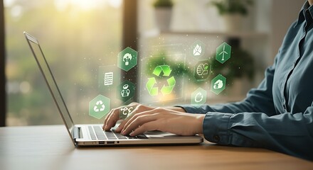 Person using laptop with green eco icons recycling sustainability technology