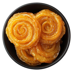 Fototapeta premium Top view of an extremely perfect looking Jalebi in a dark plate isolated on a white transparent background