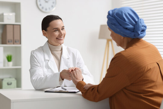 Senior woman with cancer visiting oncologist in clinic