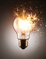 A dramatic image of a light bulb exploding, capturing shards of glass and bright sparks flying in all directions.