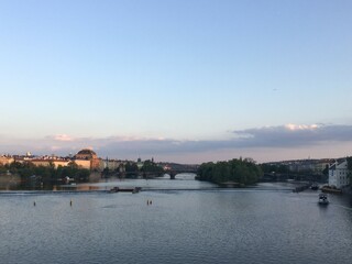 view of the city of prague at sunset