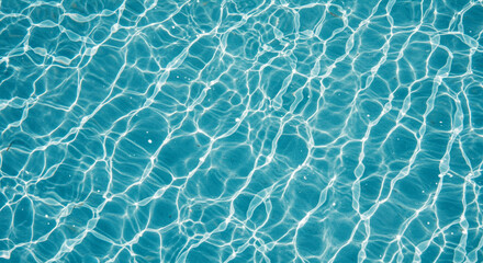 Abstract image of water surface texture with caustics reflections and ripples in the sunlight