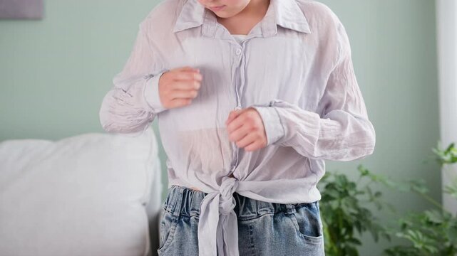 The woman wore a rumpled t-shirt.