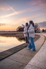 Walk along the promenade. A walk by the sea. Walking in nature. Sunset.