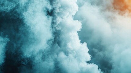 Fototapeta premium Thick, colorful clouds of smoke blend together, creating a dramatic and atmospheric effect with a hint of orange light.