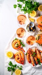 An appealing arrangement of fresh seafood including prawns, salmon and mussels alongside glasses of ros? wine creates an elegant and delicious culinary experience.