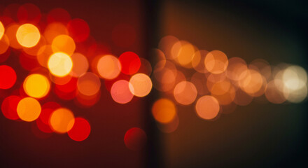 Abstract bokeh lights in warm colors creating a festive atmosphere  